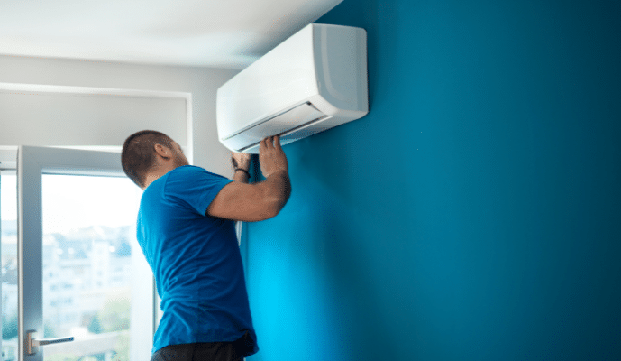 installer checking indoor AC unit